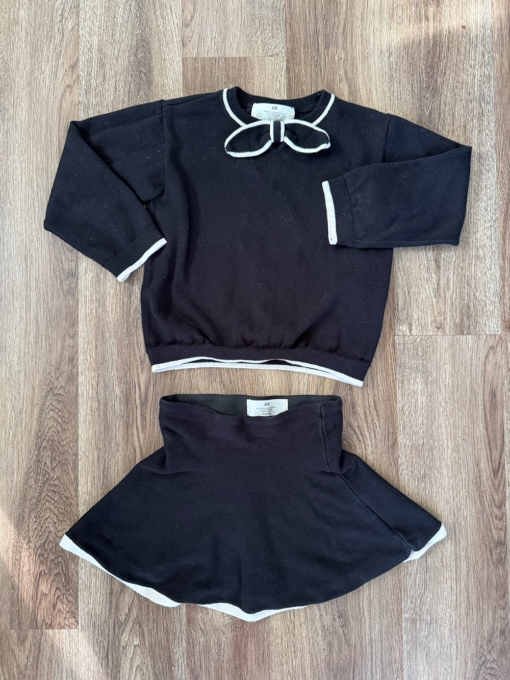 H&M Black Knit Top with White Bow Trim